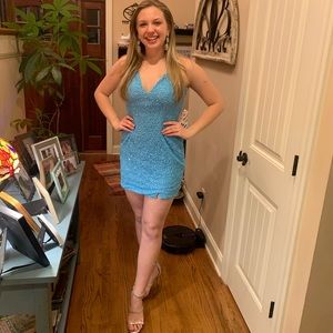 Primavera style 3291 aquamarine professionally altered to cocktail length